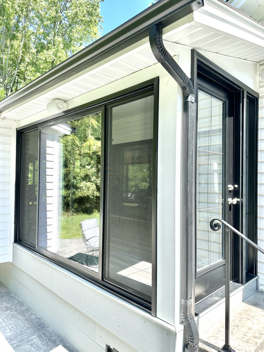 Elegant sunroom build out in Olmsted Township, designed for year-round comfort and sunlight.
