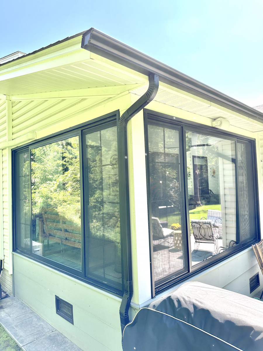Bright and inviting sunroom build out in Olmsted Township, perfect for enjoying all seasons.