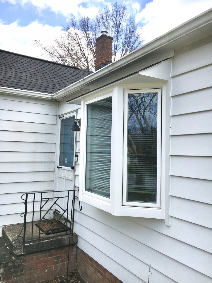 Modern bay window installation providing a fresh look to a Parma Heights home.
