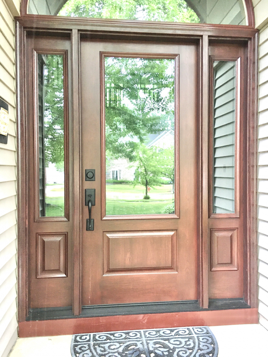 Elegant entry door and sidelites replacement in Avon, enhancing curb appeal.