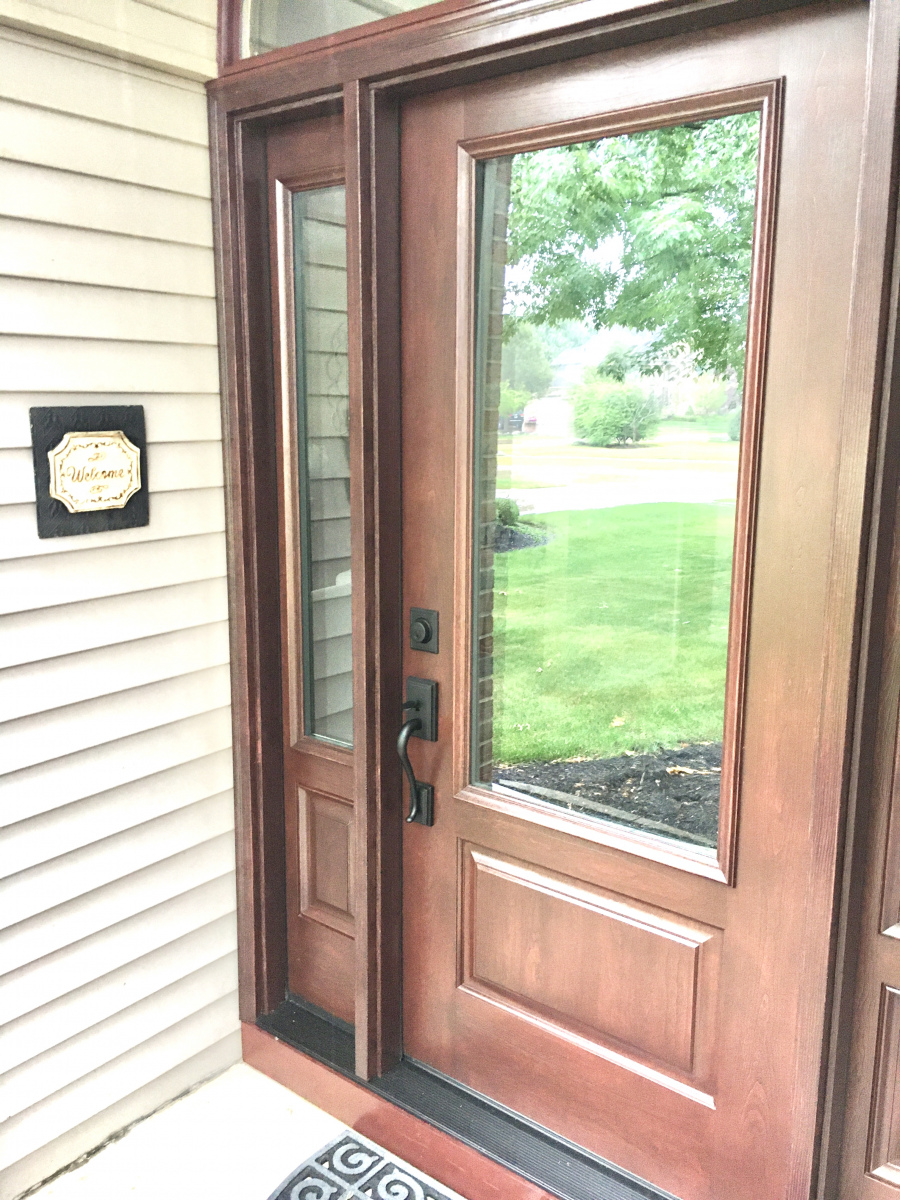 Stylish entry door and sidelites installed in Avon, revitalizing the home's look.