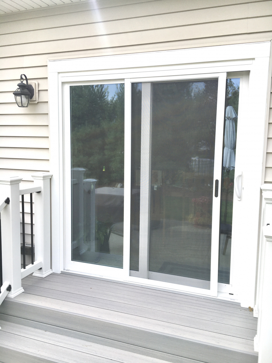 Modern patio door and window installation in Strongsville, enhancing the home's entrance and view.