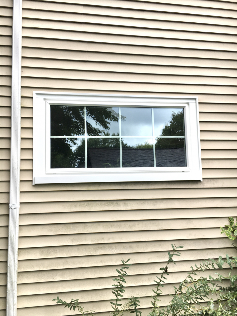 Weissman’s living room with new window build-out, adding brightness and style.